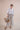 The Nori trousers are an elastic waisted 100% linen pant for a comfortable easy fit, with finishing including real natural pearl and gold plated charms at the end of the belt ties.  Embroidery designed by Fleur Kakasi at the hem. 