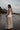 The Nori trousers are an elastic waisted 100% linen pant for a comfortable easy fit, with finishing including real natural pearl and gold plated charms at the end of the belt ties.  Embroidery designed by Fleur Kakasi at the hem. 